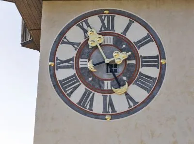 a large clock on a European clock tower