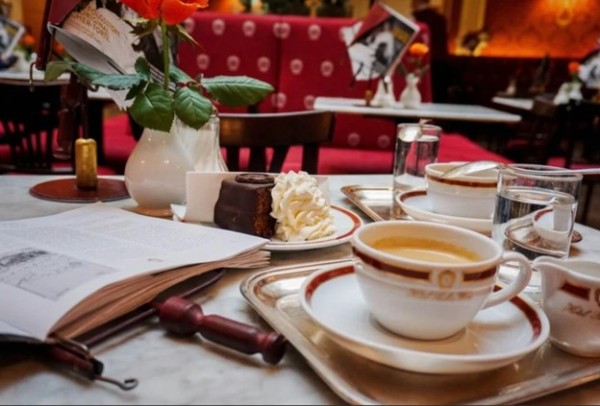 Table with coffee and chocolate cake in Graz, Austria