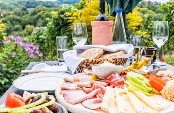 a sandwich spread at an outdoor picnic