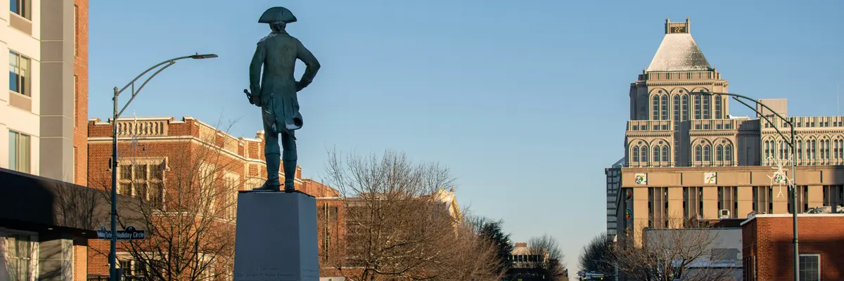 a patriotic statue in downtown Greensboro